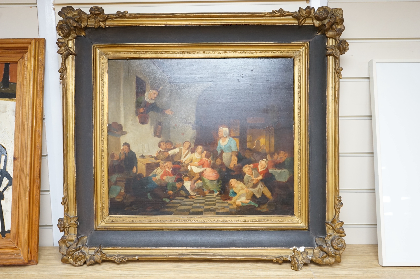 After Ferdinand de Braekeleer (1792-1883), oil on panel, Figures in an interior, 40 x 47cm. Condition - fair/good